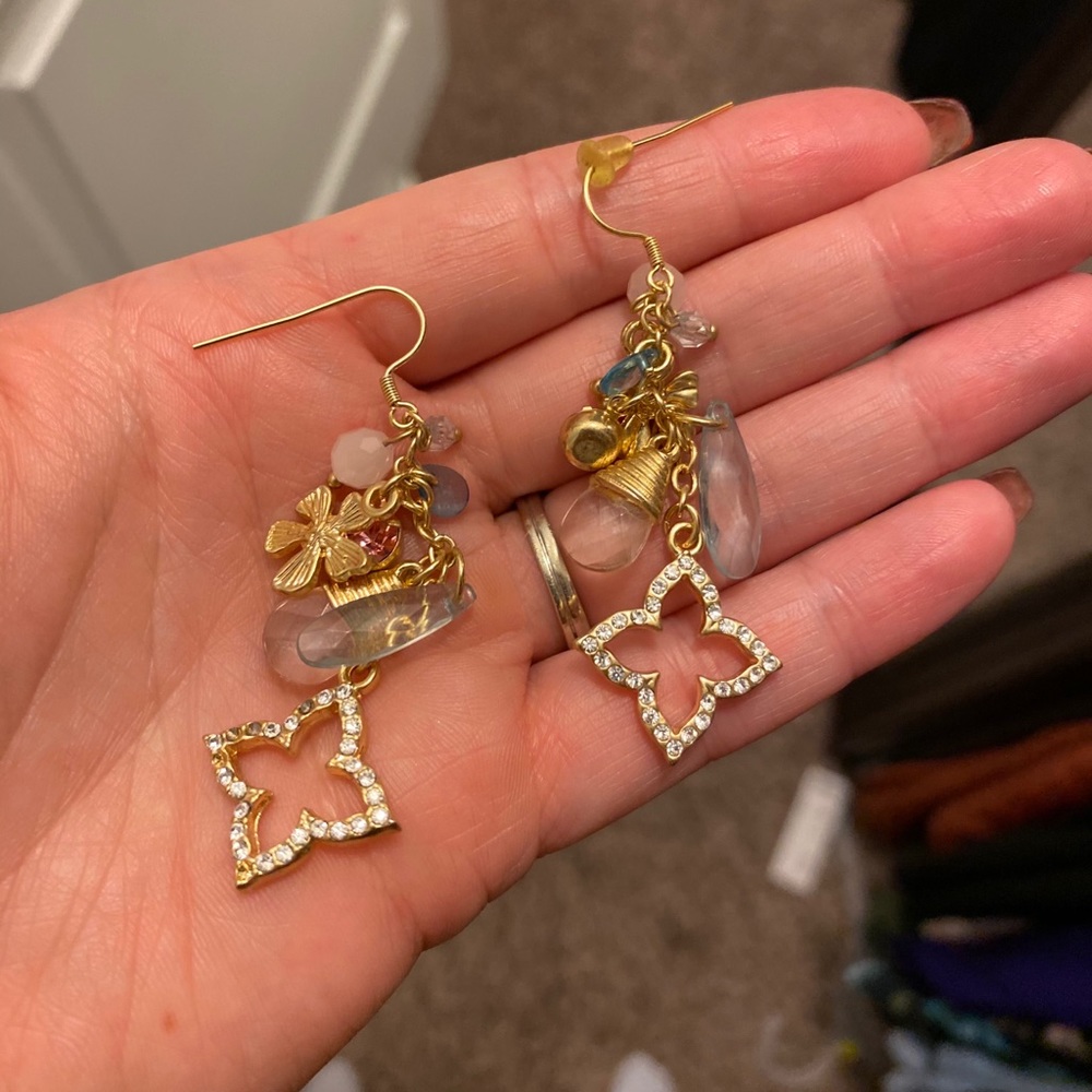 Dangle earrings with charms
